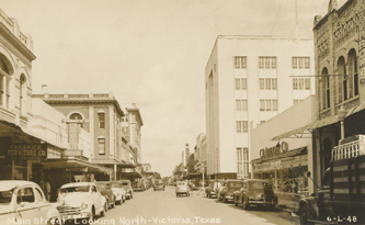 Downtown street scene, Victoria, TX:  Main Street looking north, ca 1940s.